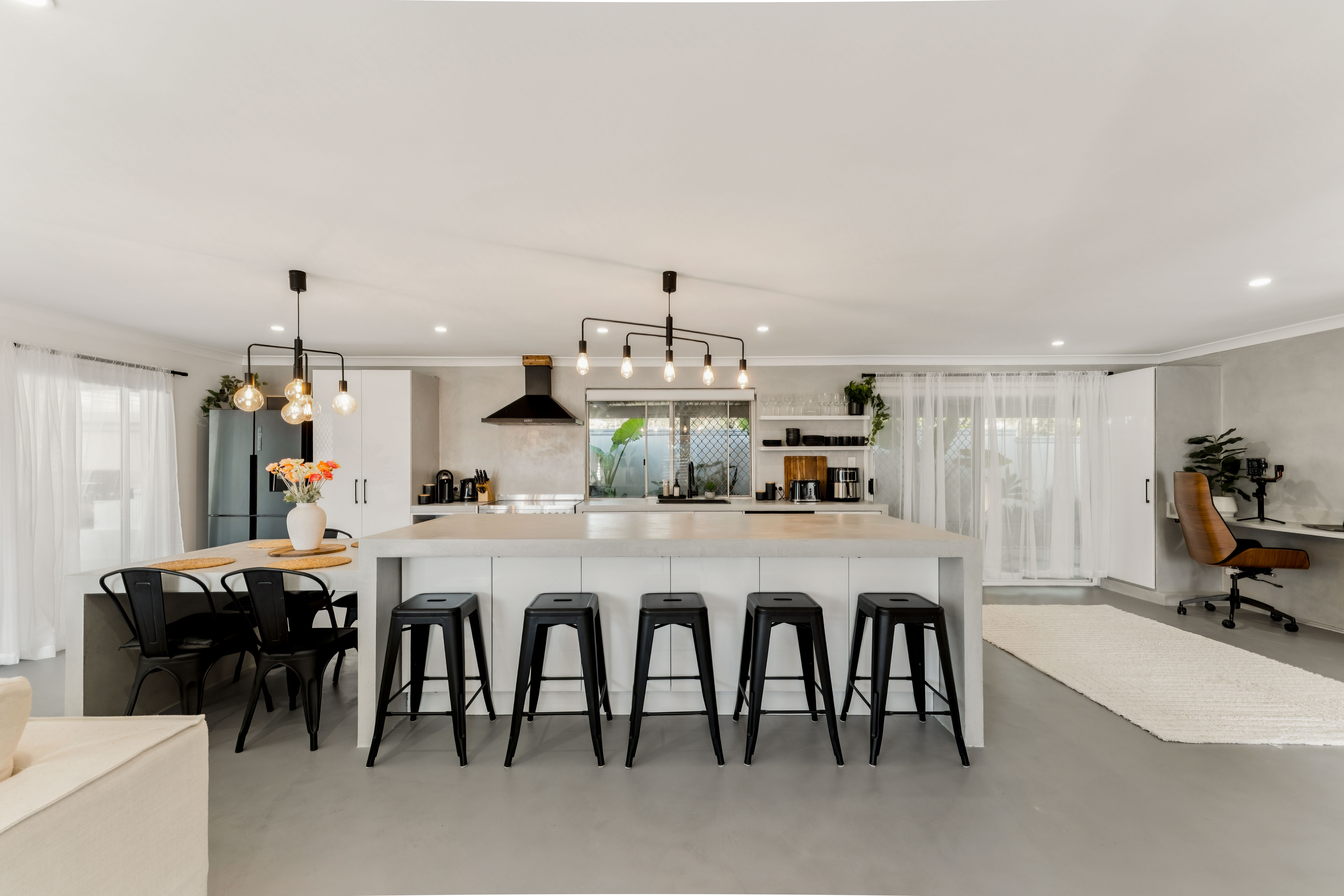 Modern microcement kitchen and living space